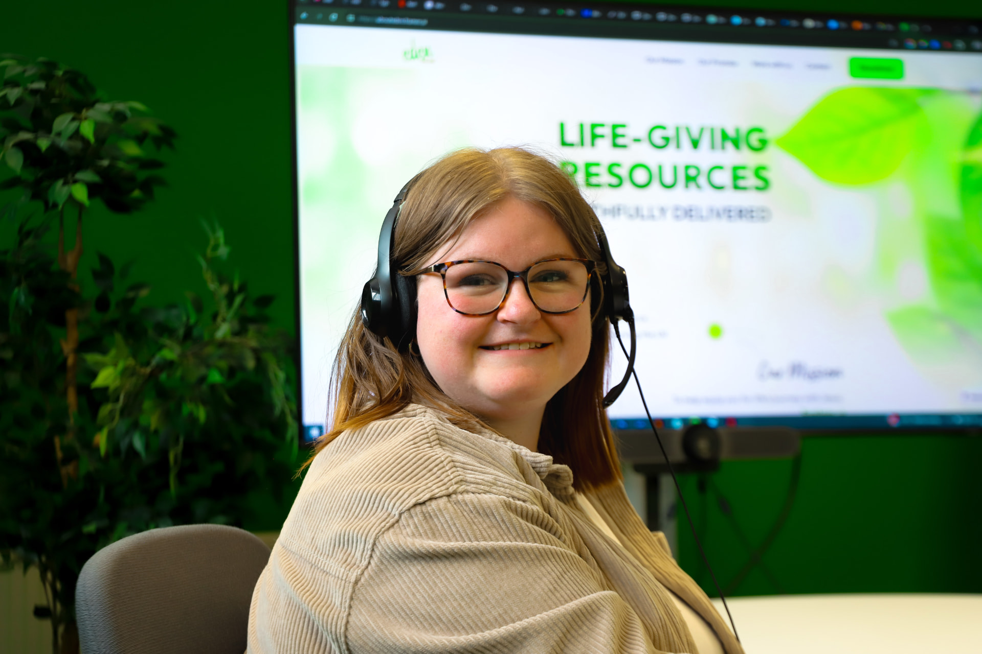 A member of the Eden team supporting a customer with their Plus Account order